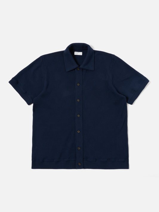 Button through polo in checkerboard knit - navy