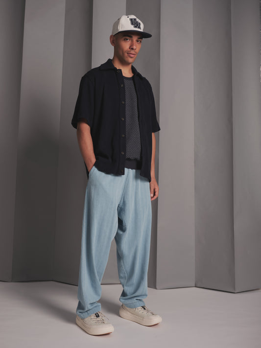 Button through polo in checkerboard knit - navy